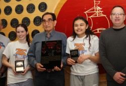 On the same occasion Watts’ granddaughter Jaidin Knighton (second from right) was named most valuable player on the senior girls team for the second year in a row. Also pictured are senrior girls coach Greg Freethy and Sarah Warman, who was recognized as defensive player of the year.