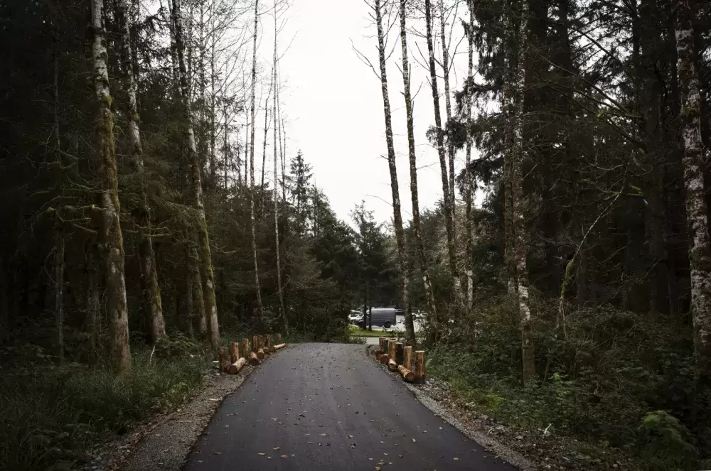 Paving is complete along the multi-use pathway, ʔapsčiik t̓ašii. New funding will link a 1.2-kilometre section of the path by the Highway 4 junction to what has already been completed in the Pacific Rim National Park Reserve. (Melissa Renwick photo)