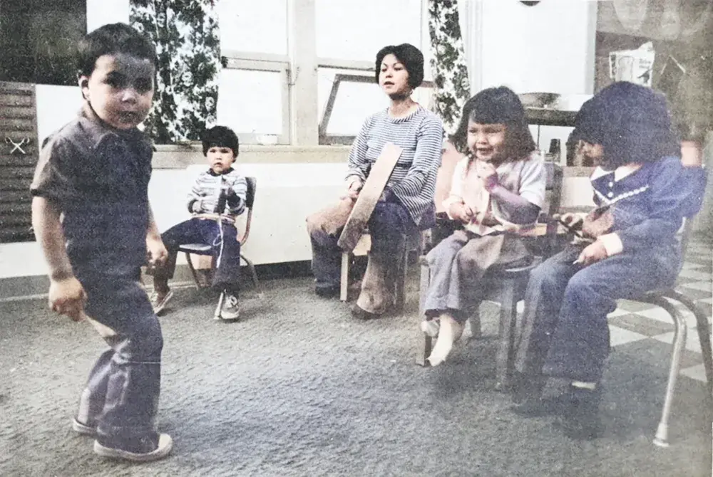 “Jim-Bob” Mack demonstrates his dancing skills at the Ha-ho-payak Play School while his classmates and teacher Anne Robinson lay down the beat. Part of the Ha-Shilth-Sa’s archive of photographs, this was originally printed Nov. 29 , 1976. (Ha-Shilth-Sa colourized archive photo)