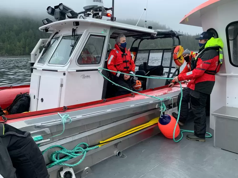 Western Canada Marine Response Corporation crew prepares containment booms on a landing ramp on Bligh Island. (Unified Command photo)