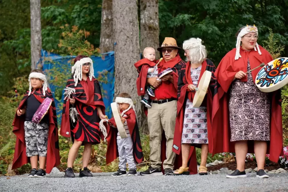 The Good family from the Snuneymuxw First Nation perform song and dance during the Chims Guest House grand opening event on Aug. 7