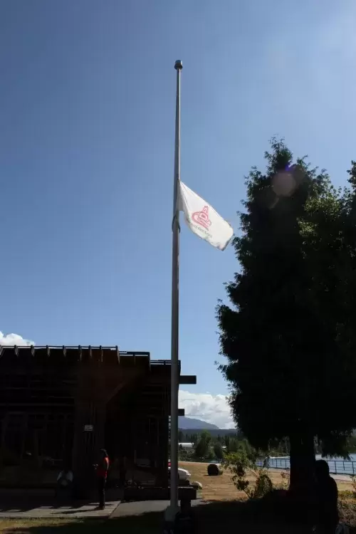 The Hupacasath flag flies at half mast at Port Alberni's Victoria Quay. (Eric Plummer photo)