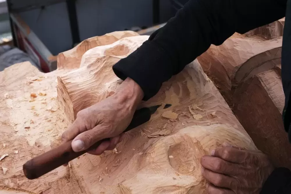 Four skeletons are carved into the totem pole representing  the Missing and Murdered Indigenous Women and Girls, all of the children who never returned home from residential school, the most recent COVID-19 pandemic, along with past pandemics Nuu-chah-nulth peoples have faced, on July 7, 2021.