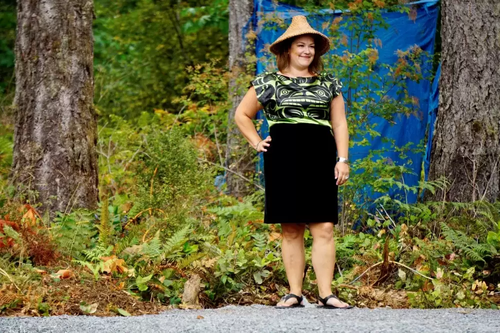 Naomi Nicholson wearing an outfit from Ay Lelum- The Good House of Design during a fashion show at the Chims Guest House grand opening event on Aug. 7. 