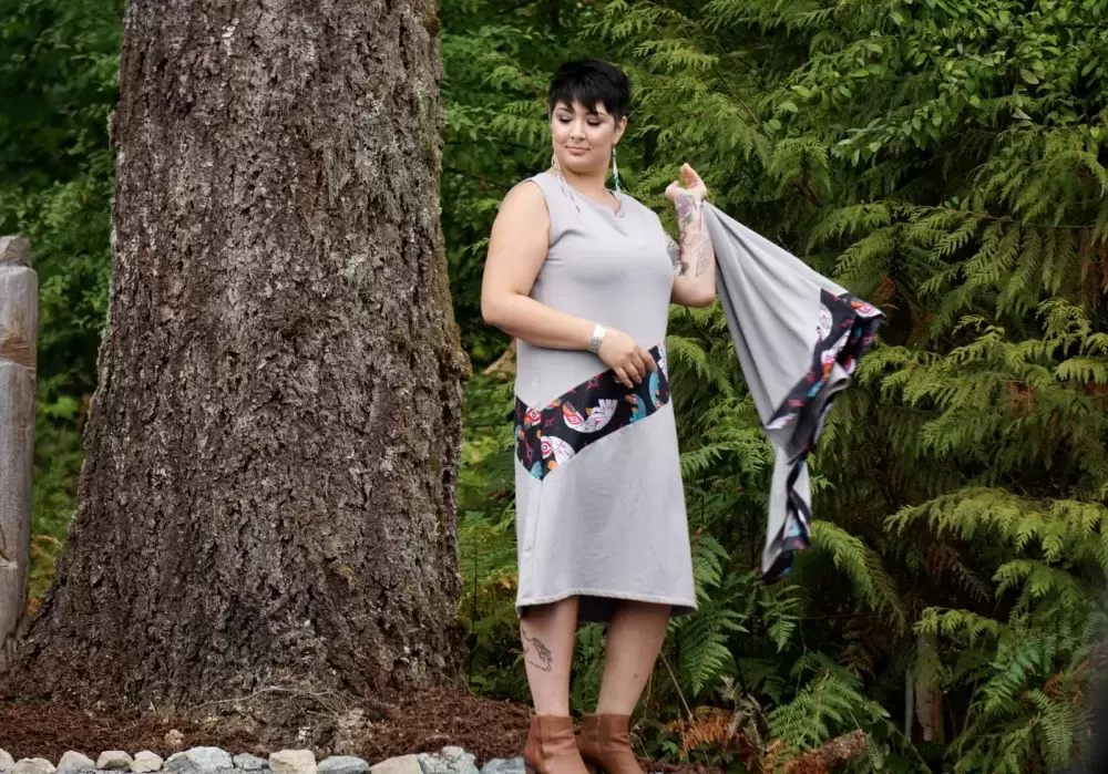 Nicole Malcomson wearing an outfit from Ay Lelum- The Good House of Design during a fashion show at the Chims Guest House grand opening event on Aug. 7. 