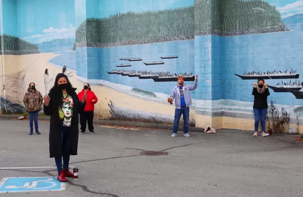 Tseshaht members welcomed the vaccine with a ceremony outside of Maht Mahs.