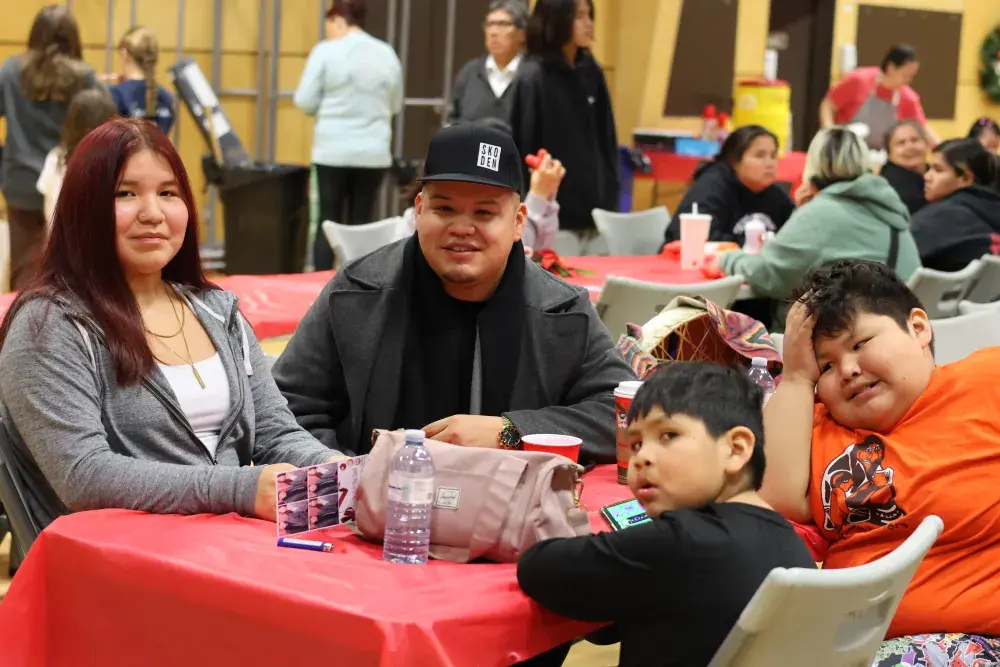 Ka:'yu:'k't'h'/Che:k'tles7et'h' First Nations’ Brandon Johnson (centre) sits with family.