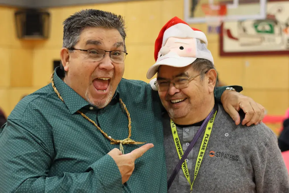 NTC Vice-President Les Doiron puts his around around Harold Amos of Ehattesaht. 
