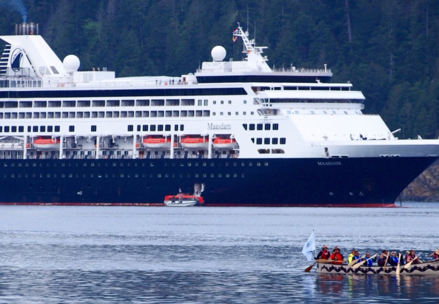 Tseshaht family paddlers greet Holland America’s cruise ship Maasdam after it dropped anchor in the Alberni harbour in 2019. (Mike Youds photo)