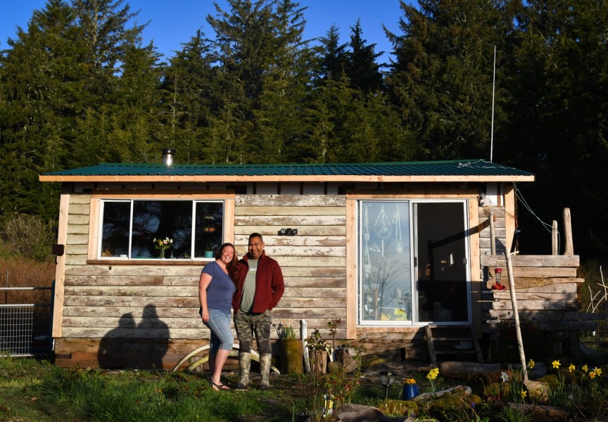 Marcie Callewaert and Lennie John pose for a photo in front of their home on Vargas Island. (Marcie Callewaert photos) 