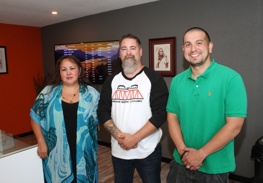 Assistant Manager Tammy Lucas(right),  Manager Ron Kyle and Tseshaht Chief Councillor Ken Watts stand in Orange Bridge Cannabis. (Eric Plummer photo)