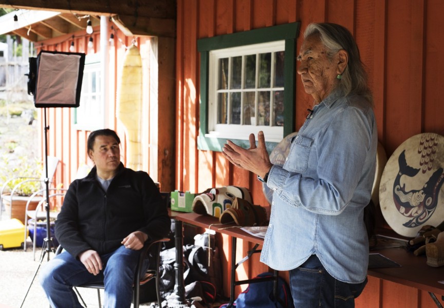 Joe David (right), a founding member of Carving on the Edge Festival, and Gordon Dick film a video segment for this year's virtual festival at the Tofino Botanical Gardens, on March 6, 2021. Photograph by Melissa Renwick