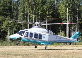 A helicopter brings Prince Edward and Princess Sophie to Ditidaht lands