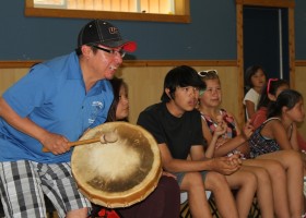 Cyril leads the drumming for a side in Lahal