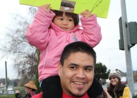 Parents and kids working together on Idle No More 4