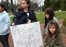 Parents and kids working together on Idle No More 2
