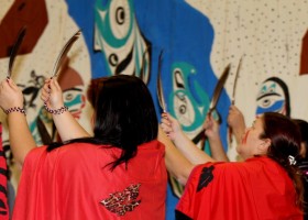 Family dancers welcome their guests