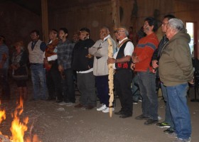 Nuu-chah-nulth Ha'wiih stand to accept gifts from the Nisqually