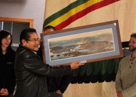 Chief Councillor Moses Martin receives gift from Clayoquot Conservation Society